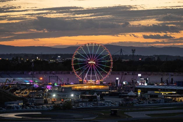 The Ferris wheel at the Glücksgefühle Festival at the Hockenheimring in the evening light, Hockenheim, Baden-Württemberg, Germany