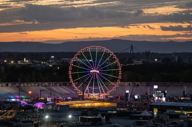The Ferris wheel at the Glücksgefühle Festival at the Hockenheimring in the evening light, Hockenheim, Baden-Württemberg, Germany