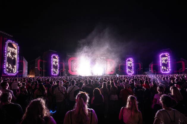 Overview of the large crowd of festivalgoers at Ski Aggu s performance at the Glücksgefühle Festival at the Hockenheimring in Hockenheim, Baden-Württemberg, Germany