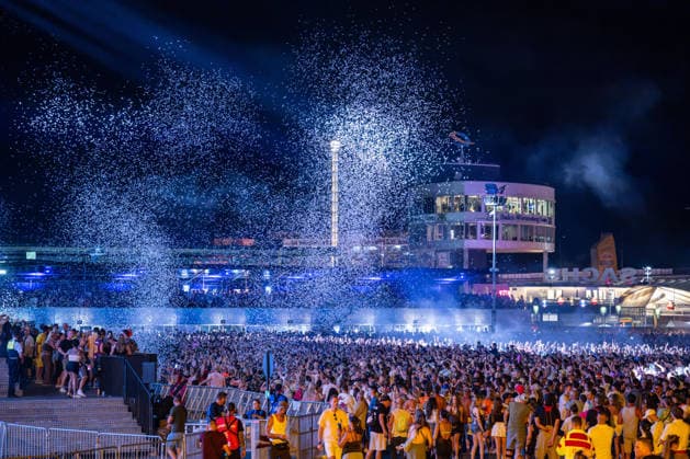 Overview of the large crowd of festivalgoers at Dimitri Vegas Like Mike s performance at the Glücksgefühle Festival at the Hockenheimring in Hockenheim, Baden-Württemberg, Germany