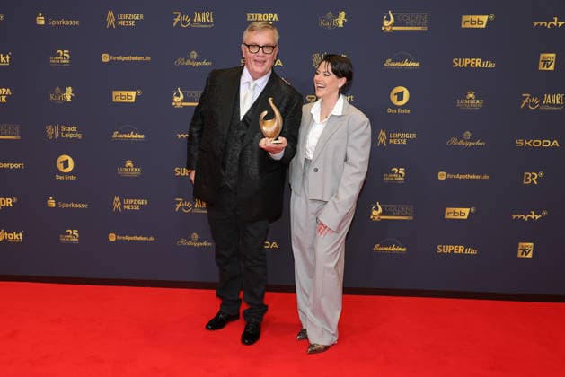 2026 Golden Hen Awards Ceremony: Entertainer Hape Kerkeling, winner of the Golden Hen in the Film and Television category, holding the Golden Hen, with presenter Tahnee Schaffarczyk. The 2026 Golden Hen Awards Ceremony took place on September 4, 202026 at the Leipzig Trade Fair, Hall 1, Leipzig, Saxony, Germany