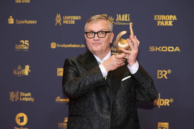 2026 Golden Hen Awards Ceremony: Entertainer Hape Kerkeling, winner of the Golden Hen in the Film and Television category, holding the Golden Hen. The 2026 Golden Hen Awards Ceremony took place on September 4, 2026, at the Leipzig Trade Fair, Hall 1, Leipzig, Saxony, Germany