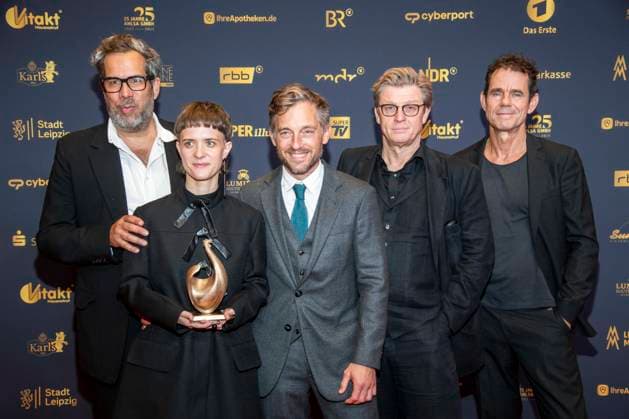 ABB GOLDHENNE Achim von Borries, Liv Lisa Fries, Volker Bruch, Henk Handloegten, and Tom Tykwer—the Babylon Berlin award winners—appeared with Henne on the red carpet at the 32nd Golden Hen Audience Award ceremony at the Neue Messe Leipzig on September 4, 2026, in Leipzig, Saxony, Germany