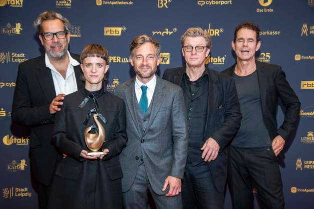 ABB GOLDHENNE Achim von Borries, Liv Lisa Fries, Volker Bruch, Henk Handloegten, and Tom Tykwer—the Babylon Berlin award winners—appeared with Henne on the red carpet at the 32nd Golden Hen Audience Award ceremony at the Neue Messe Leipzig on September 4, 2026, in Leipzig, Saxony, Germany