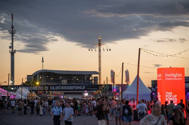 Numerous festivalgoers attend the Glücksgefühle Festival on the grounds of the Hockenheimring in Hockenheim, Baden-Württemberg, Germany