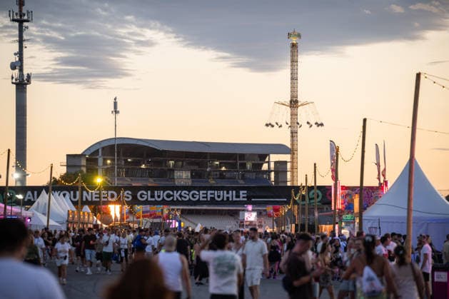 Numerous festivalgoers attend the Glücksgefühle Festival on the grounds of the Hockenheimring in Hockenheim, Baden-Württemberg, Germany