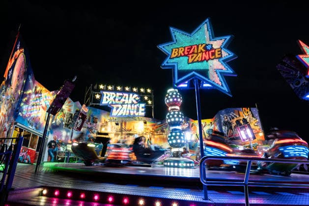 The Breakdance amusement ride at the Glücksgefühle Festival at the Hockenheimring at night in Hockenheim, Baden-Württemberg, Germany