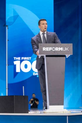 4 September 2026 Jordan Bardella delivers keynote speech at Reform UK Conference 4 September 2026, Birmingham, UK: Jordan Bardella, President of National Rally, delivers a keynote speech on the main stage during the Reform UK National Conference 2026 at the NEC Birmingham. Bardella addresses delegates during the first day of the conference, bringing an international political dimension to the Reform UK event., Credit:Abdullah Bailey Anthony Bailey - B2421 Avalon  Copyright: xAbdullahxBaileyx xAnthonyxBaileyx-xB2421x xAvalonx 1130998931