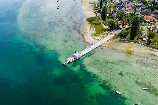 Boat dock at Mannenbach Harbor in the canton of Thurgau. Lake Constance has low water levels following a summer with little rainfall. August 27, 2026, Mannenbach Salenstein, Canton of Thurgau, Switzerland