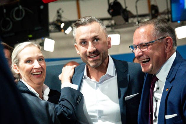 Election in Saxony-Anhalt: Alice Weidel, chairwoman of the AfD, along with Ulrich Siegmund of Alternative for Germany (AfD) and Tino Chrupalla, chairman of the AfD, cheering as the 6:00 p.m. projections were announced, which they watched together in the exhibition hall in Magdeburg. Scenes from the exhibi