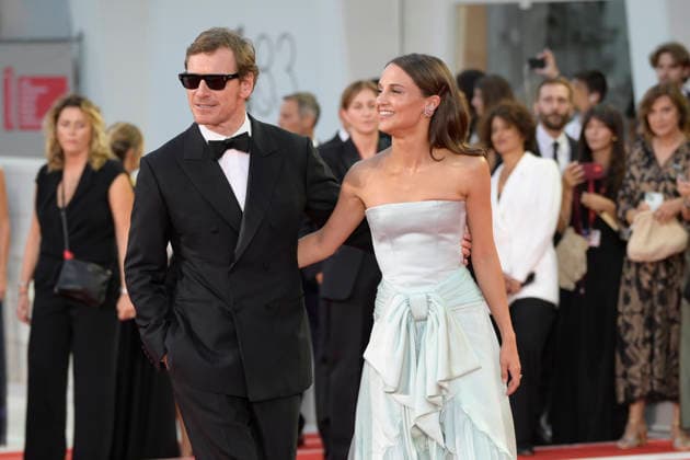 The echo chamber red carpet in Venice Lido - 06 Sep 2026 Michael Fassbender (l) and Alicia Vikander (r) attend the red carpet of movie The echo chamber during the 83rd Venice Film Festival at Palazzo del cinema. Venice Lido Italy Copyright: xMarioxCartellix xSOPAxImagesx _DSC9604