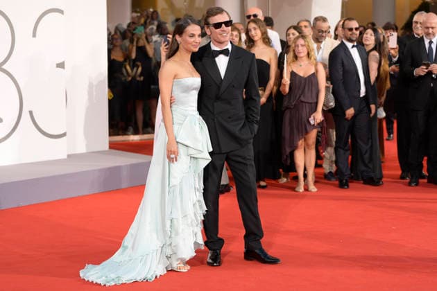 The echo chamber red carpet in Venice Lido - 06 Sep 2026 Michael Fassbender (l) and Alicia Vikander (r) attend the red carpet of movie The echo chamber during the 83rd Venice Film Festival at Palazzo del cinema. Venice Lido Italy Copyright: xMarioxCartellix xSOPAxImagesx _DSC9659