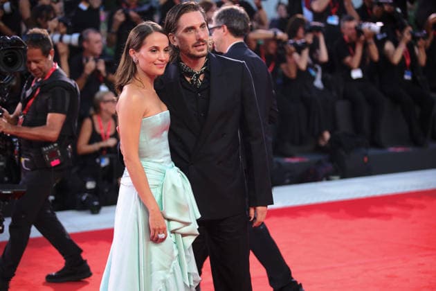 83rd Venice International Film Festival in Venice, Italy - 06 Sep 2026. Swedish actress Alicia Vikander and Italian actor Luca Marinelli attend the red carpet of the film The Echo Chamber at the 83rd Venice International Film Festival at the Sala Grande. The Filming Italy Venice Award delegation, with 80 international and national guests, will also walk this carpet afterward. Venice Italy Copyright: xMarcoxBaradax xSOPAxImagesx 20260906_RED CARPET THE ECHO CHAMBER AND HOMBRE AL AGUA-1370