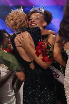 Regan Hutsell, Miiss Texas and newly crowned Miss America 2027 (right), hugs the former reigning Miss America, Cassie Donegan of New York, at the West Palm Beach Convention Center in West Palm Beach, Florida on Sunday, September 6, 2026.  MIA20260906244 GaryxIxRothstein