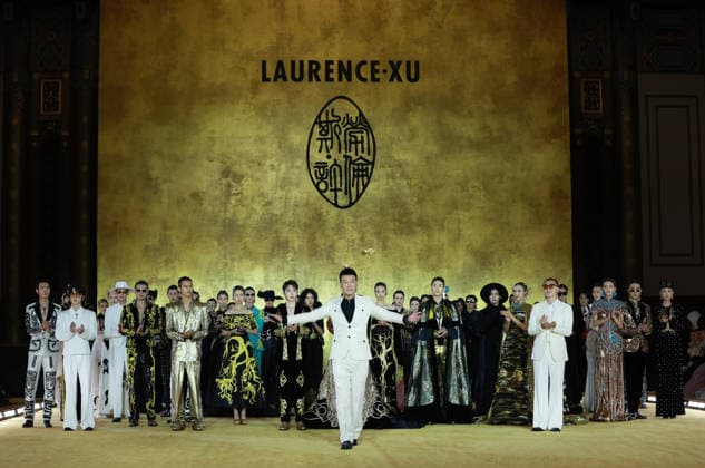 (260907) -- BEIJING, Sept. 7, 2026 -- Chinese designer Laurence Xu greets the audience during the opening ceremony of SS2027 Beijing Fashion Week in Beijing, capital of China, Sept. 7, 2026. SS2027 Beijing Fashion Week kicked off on Monday. ) CHINA-BEIJING-SS2027 BEIJING FASHION WEEK-LAURENCE XU (CN) GaoxJing 