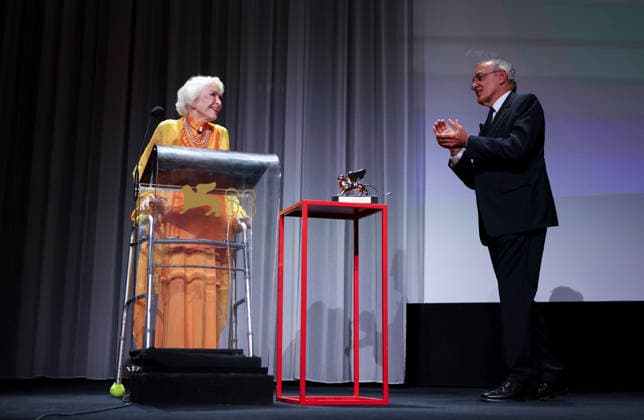 (260907) -- VENICE, Sept. 7, 2026 -- Actress Ellen Burstyn (L) receives congratulations from Alberto Barbera, artistic director of the 83rd Venice International Film Festival, after being awarded the trophy of the Golden Lion for Lifetime Achievement at the 83rd Venice International Film Festival in Venice, Italy, Sept. 7, 2026. ) ITALY-VENICE-FILM FESTIVAL-ELLEN BURSTYN-LIFETIME ACHIEVEMENT WangxKaiyan 