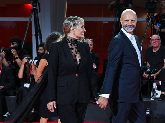 IPA88249684 - Venice, 83rd Venice International Film Festival 2026 - Night 6 - Red carpet for the film *Diva e Donna* - Pictured: Heather Parisi, her husband Umberto Maria Anzolin  Copyright: xManuelexMangiarottix xPoolxPhotoxEventsx08x IPA88249684