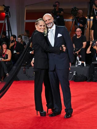 IPA88249692 - Venice, 83rd Venice International Film Festival 2026 - Night 6 - Red carpet for the film *Diva e Donna* - Pictured: Heather Parisi, her husband Umberto Maria Anzolin  Copyright: xManuelexMangiarottix xPoolxPhotoxEventsx08x IPA88249692