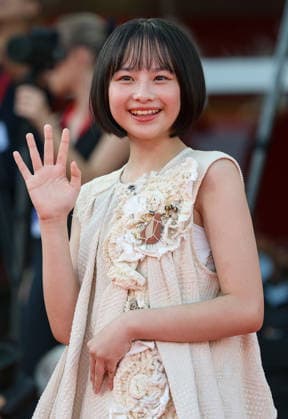 (260907) -- VENICE, Sept. 7, 2026 -- Japanese actress Fuuri Nanase of the film Look Back poses at the red carpet before the premiere of the film during the 83rd Venice International Film Festival in Venice, Italy, Sept. 7, 2026. ) ITALY-VENICE-FILM FESTIVAL-LOOK BACK-PREMIERE WangxKaiyan 