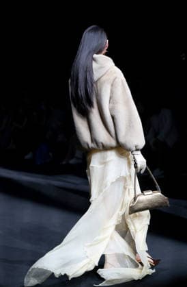 BEIJING, CHINA - SEPTEMBER 07: SYNA brand fashion is displayed on the runway at the 2026 China International Fashion Week Autumn session on September 7, 2026 in Beijing, China. The event showcases latest collections from various designers and brands.  Copyright: xVCGx 111664998762