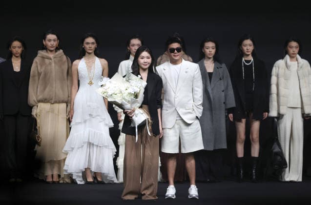 BEIJING, CHINA - SEPTEMBER 07: SYNA brand fashion is displayed on the runway at the 2026 China International Fashion Week Autumn session on September 7, 2026 in Beijing, China. The event showcases collections from various designers and brands for the upcoming season.  Copyright: xVCGx 111664998767