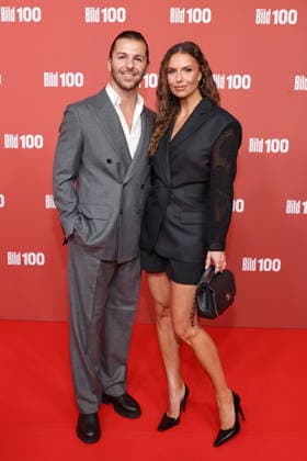 September 8, 2026, Riccardo Basile and Laura Wontorra on the red carpet at BILD100 2026, Axel Springer s new building, Berlin, Berlin