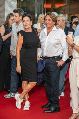 ABB ADAMSACHT: Katy Karrenbauer, accompanied by a male guest, walks the red carpet at the Berlin premiere of the film *Adams Acht* at the Zoo Palast movie theater on September 8, 2026, in Berlin, Germany.