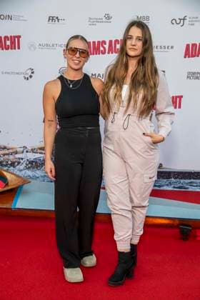 ABB ADAMSACHT: Jessica Scholz and Annie Schmitz on the red carpet at the Berlin premiere of the feature film *Adams Acht* at the Zoo Palast movie theater on September 8, 2026, in Berlin, Germany