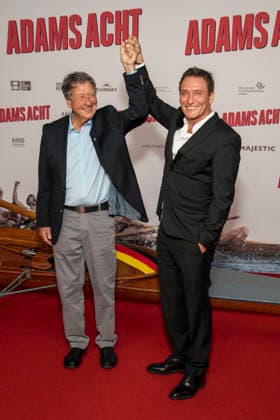 ABB ADAMSACHT: Oliver Masucci and Klaus Bittner appear on the red carpet at the Berlin premiere of the feature film *Adams Acht* at the Zoo Palast movie theater on September 8, 2026, in Berlin, Germany