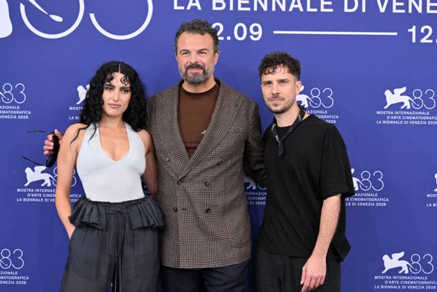 September 9, 2026, Venice, Rome, Italy: La NiÃ¢oeÃ¢ ™a, the pseudonym of Carola Moccia, director Edoardo De Angelis and Alfredo Maddaluno during the photocall for the film The Fire You Carry Inside, 83rd Venice Film Festival. Venice, September 9, 2026 Venice Italy  - ZUMAa289 20260909_zia_a289_152 Copyright: xMariaxLauraxAntonellix xAgfx