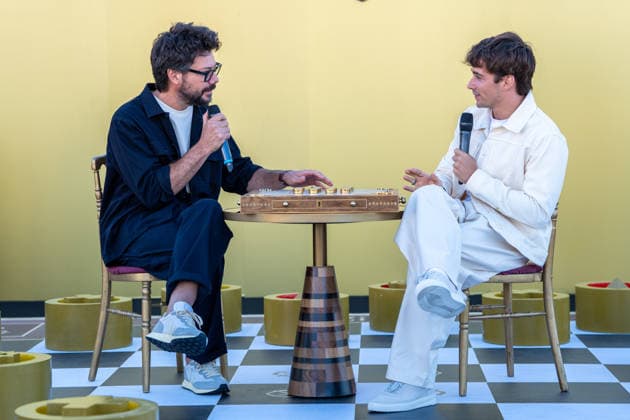 Monegasque Formula 1 driver Charles Leclerc (r) challenges Spanish actor Alvaro Morte to a game of his new board game SE!ZE in Madrid during the official presentation of Chivas Regal 16. September 9, 2026. (2026090987)