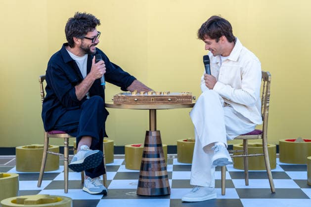 Monegasque Formula 1 driver Charles Leclerc (r) challenges Spanish actor Alvaro Morte to a game of his new board game SE!ZE in Madrid during the official presentation of Chivas Regal 16. September 9, 2026. (20260909100)
