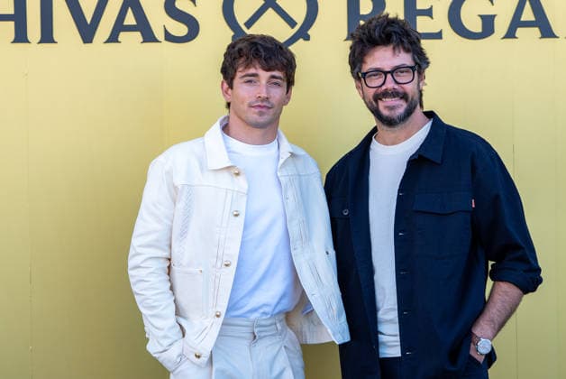 Monegasque Formula 1 driver Charles Leclerc (l) challenges Spanish actor Alvaro Morte to a game of his new board game SE!ZE in Madrid during the official presentation of Chivas Regal 16. September 9, 2026. (20260909290)