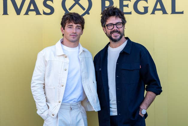 Monegasque Formula 1 driver Charles Leclerc (l) challenges Spanish actor Alvaro Morte to a game of his new board game SE!ZE in Madrid during the official presentation of Chivas Regal 16. September 9, 2026. (20260909293)