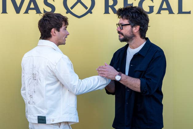 Monegasque Formula 1 driver Charles Leclerc (l) challenges Spanish actor Alvaro Morte to a game of his new board game SE!ZE in Madrid during the official presentation of Chivas Regal 16. September 9, 2026. (20260909299)