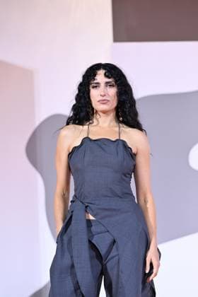 September 9, 2026, Venice, Rome, Italy: Carola Moccia, aka Nina, on the red carpet for The Fire That You Carry Inside, at the 83rd Venice Film Festival. Venice, September 9, 2026 Venice Italy  - ZUMAa289 20260909_zia_a289_548 Copyright: xMariaxLauraxAntonellix xAgfx