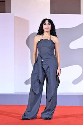 September 9, 2026, Venice, Rome, Italy: Carola Moccia, aka Nina, on the red carpet for The Fire That You Carry Inside, at the 83rd Venice Film Festival. Venice, September 9, 2026 Venice Italy  - ZUMAa289 20260909_zia_a289_549 Copyright: xMariaxLauraxAntonellix xAgfx