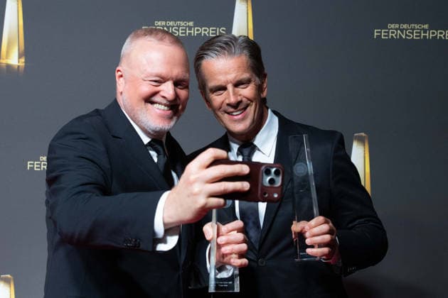 Award winners Stefan RAAB and Markus LANZ (from left) take a selfie with a smartphone at the German Television Award ceremony, the 2026 German Television Award, held at Confex Cologne on September 9, 2025