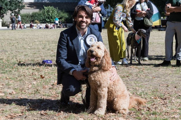 September 10, 2026, London, England, United Kingdom: Bobby Dean MP and his canine companion goldendoodle Chester, the winners of the 3rd place in the Westminster Dog of the Year competition pose in the Victoria Tower Gardens during the Westminster Dog of the Year competition. The event is a celebration of the unique bond between dogs and their owners, and gives parliamentarians the opportunity to highlight the important work that they ve undertaken in Parliament on dog related matters, whilst promoting responsible dog ownership. London United Kingdom  - ZUMAs371 20260910_zip_s371_014 Copyright: xWiktorxSzymanowiczx