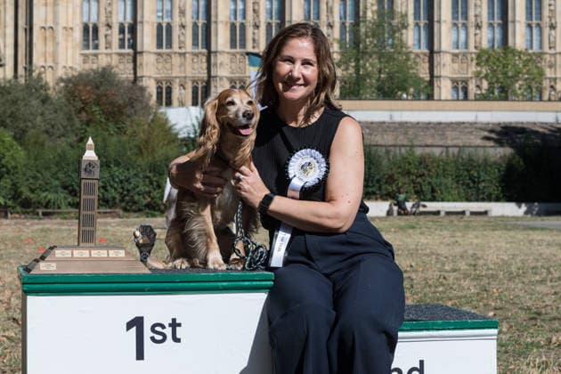 September 10, 2026, London, England, United Kingdom: Anna McMorrin MP and her working cocker spaniel Cadi, the winners of the 1st place in the Westminster Dog of the Year competition pose in the Victoria Tower Gardens during the Westminster Dog of the Year competition. The event is a celebration of the unique bond between dogs and their owners, and gives parliamentarians the opportunity to highlight the important work that they ve undertaken in Parliament on dog related matters, whilst promoting responsible dog ownership. London United Kingdom - ZUMAs371 20260910_zip_s371_003 Copyright: xWiktorxSzymanowiczx