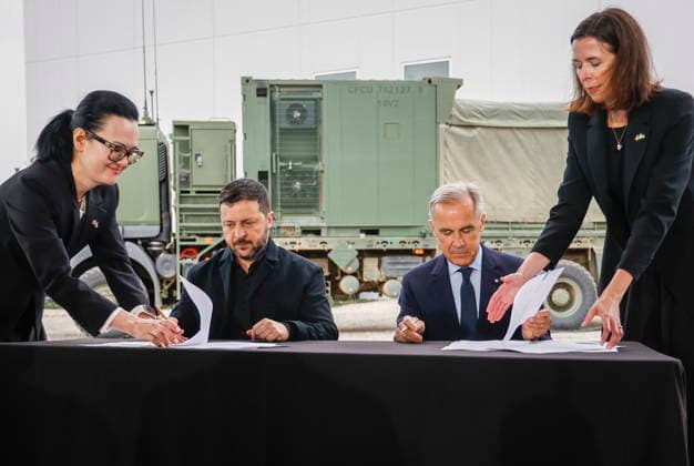 September 10, 2026, Calgary, Ab, CANADA: Prime Minister Mark Carney, right, and Volodymyr Zelenskyy, president of Ukraine, sign agreements in Calgary, Alta., Thursday, Sept. 10, 2026. Calgary CANADA - ZUMAc35_ 20260910_zaf_c35_050 Copyright: xJeffxMcintoshx