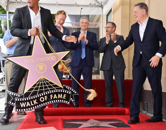 American screenwriter, television producer and director Greg Daniels (C) reacts during an unveiling ceremony honoring him with the 2,856th star on the Hollywood Walk of Fame in Los Angeles on Thursday, September 10, 2026.  LAP2026091001 JIMxRUYMEN