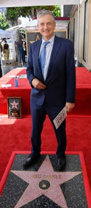 American screenwriter, television producer and director Greg Daniels stands on his star during an unveiling ceremony honoring Daniels with the 2,856th star on the Hollywood Walk of Fame in Los Angeles on Thursday, September 10, 2026.  LAP2026091012 JIMxRUYMEN