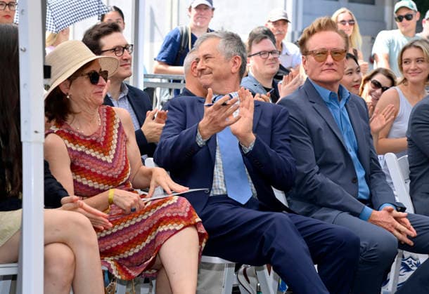American screenwriter, television producer and director Greg Daniels (C) and his wife Susanne Daniels (L), and Conan O Brien react to comments during an unveiling ceremony honoring Daniels with the 2,856th star on the Hollywood Walk of Fame in Los Angeles on Thursday, September 10, 2026.  LAP2026091019 JIMxRUYMEN
