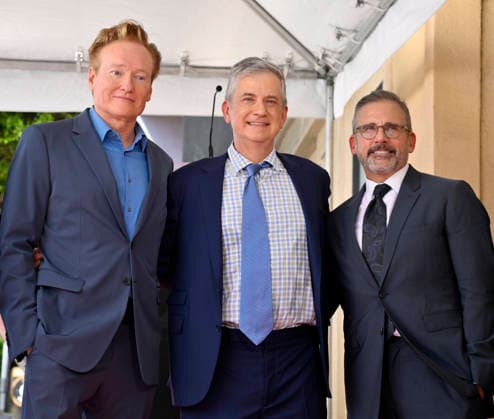 American screenwriter, television producer and director Greg Daniels (C) is joined by Conan O Brien (L) and Steve Carell during an unveiling ceremony honoring Daniels with the 2,856th star on the Hollywood Walk of Fame in Los Angeles on Thursday, September 10, 2026.  LAP2026091022 JIMxRUYMEN
