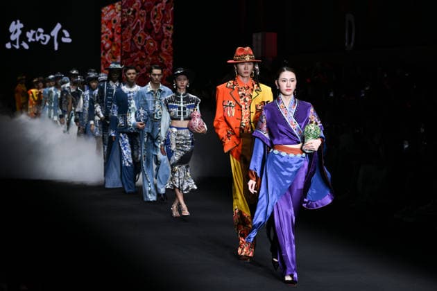 BEIJING, CHINA - SEPTEMBER 10: Models display fashion designs during the Zhu Bingren Jingpai Rongzhuang bronze fusion fashion show at SS2027 Beijing Fashion Week on September 10, 2026 in Beijing, China. The event features high-end couture incorporating traditional bronze casting techniques and a unique color system.  Copyright: xChinaxNewsxServicex 111665694840