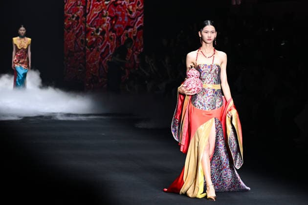 BEIJING, CHINA - SEPTEMBER 10: Models display designs during the Zhu Bingren bronze fusion fashion show at SS2027 Beijing Fashion Week on September 10, 2026 in Beijing, China. The event features high-end couture incorporating traditional bronze casting techniques and a unique color system.  Copyright: xChinaxNewsxServicex 111665695231