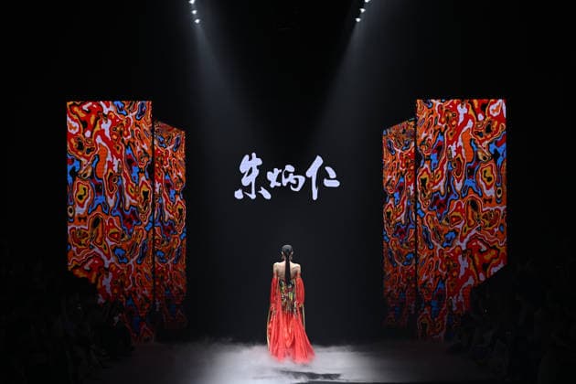 BEIJING, CHINA - SEPTEMBER 10: Models display designs during the Zhu Bingren Jingpai Rongzhuang fashion show at the SS2027 Beijing Fashion Week on September 10, 2026 in Beijing, China. The collection features molten copper art and a unique color system created by designer Zhu Bingren.  Copyright: xChinaxNewsxServicex 111665695627