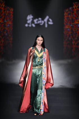BEIJING, CHINA - SEPTEMBER 10: Models display designs during the Zhu Bingren bronze fusion fashion show at SS2027 Beijing Fashion Week on September 10, 2026 in Beijing, China. The collection features molten copper art and a unique color system created by designer Zhu Bingren.  Copyright: xChinaxNewsxServicex 111665694904