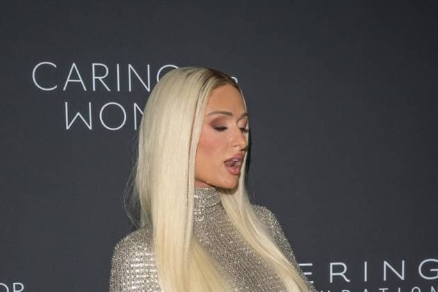 September 10, 2026, New York, New York, United States: Paris Hilton attends.Celebrities attend the Kering Foundation s Caring For Women Dinner at The Pool on September 10, 2026 in New York City. New York United States  - ZUMAs197 20260910_aaa_s197_778 Copyright: xRonxAdarx